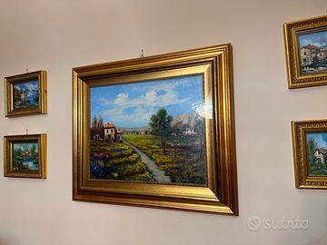 5 quadri con cornice dorata