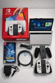 Nintendo Switch OLED Scatola + Accessori + Giochi