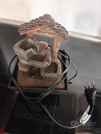 Fontana elettrica con sassolini 