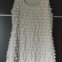 Abito smanicato Zara beige con balze – Elegante e 