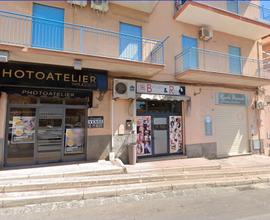 Locale commerciale locato con reddito