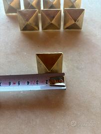 Borchie in ottone massiccio