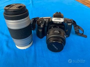 Macchina fotografica e teleobiettivo Minolca