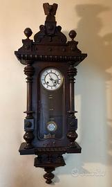 Orologio a pendolo da parete