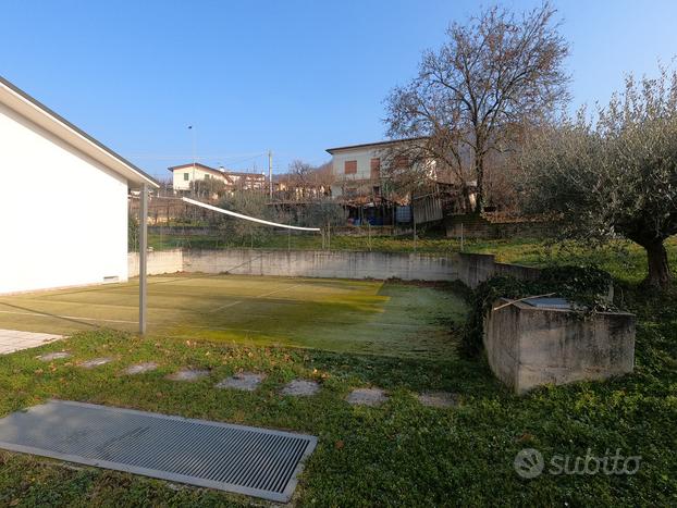 Garage con terreno edificabile ed agricolo