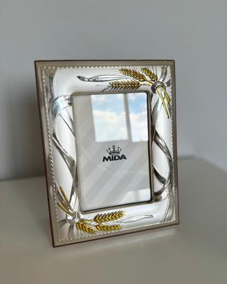 cornice in argento