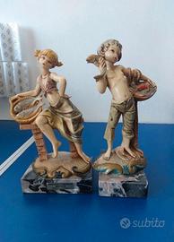 Coppia di Statue e Base in Marmo targate Simonelli