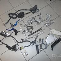 R6 02 : carburatori pinza pompa radiatore cerchi