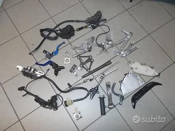 R6 02 : carburatori pinza pompa radiatore cerchi