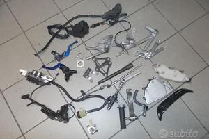 R6 02 : carburatori pinza pompa radiatore cerchi