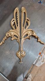 Fregi in legno dorato