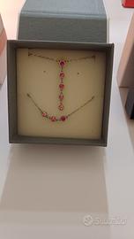 Collana e bracciale con punti luce rosa