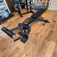 Panca con leg extension curl