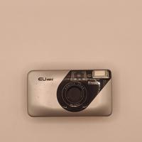 Konica EU-mini con lente Konica