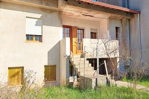 Villetta a schiera con cortile