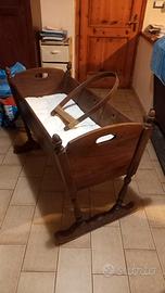 Culla a dondolo inizio 900 circa in noce