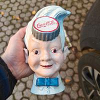 testa salvadanaio coca cola