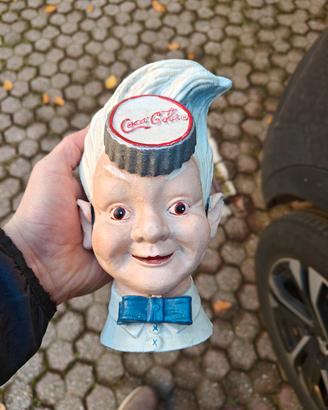 testa salvadanaio coca cola