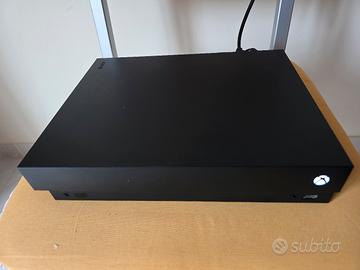 Xbox one x con 2 joystick e 9 giochi