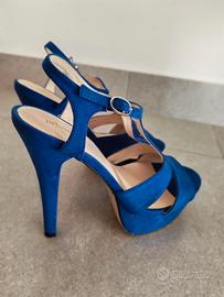 Sandali blu con tacco  12