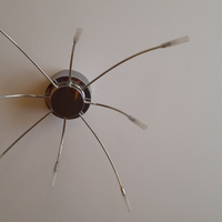 Lampadario in acciaio a raggi da soggiorno