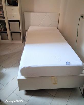 letto singolo bianco con testata e contenitore