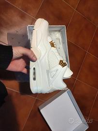 Jordan 4 metallic gold