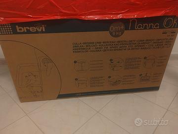 culla dondolo fianco letto