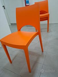 4 sedie design impilabili arancioni