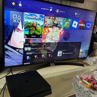 PS4 Slim 1TB + 2 controller + 4 giochi