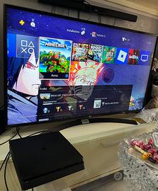 PS4 Slim 1TB + 2 controller + 4 giochi