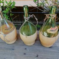 3 bottiglie fiaschi con veste in plastica. Vintage