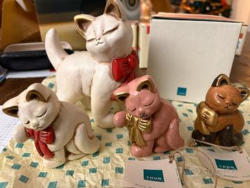 Gatti con fiocco rosso Thun