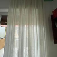 Coppia di tendoni in seta per portafinestra