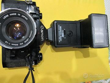 180 € CANON A-1 + 50 mm e 100-200 mm