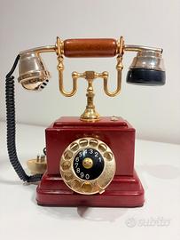 Telefono vintage a disco rosso bordeaux