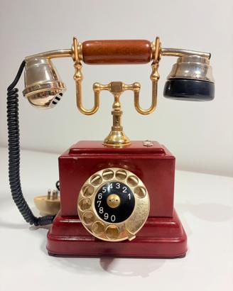 Telefono vintage a disco rosso bordeaux