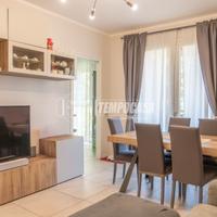 TRILOCALE CON DOPPI SERVIZI IN CONDOMINIO DI RECEN