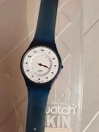 Swatch Skin SFN100 con box