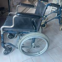 Sedia a rotelle e deambulatore