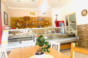 Tavola calda pizzeria d'asporto