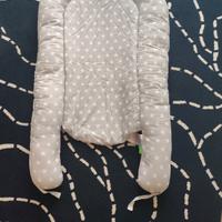 riduttore lettino/ contenitivo 