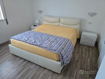 Letto matrimoniale contenitore con testiera
