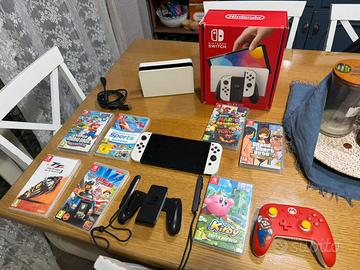 Nintendo Switch OLED bianca + 7 giochi e accessori