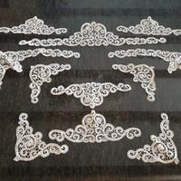 Applicazioni artigianali in pizzo tombolo di Cantù