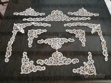 Applicazioni artigianali in pizzo tombolo di Cantù