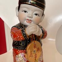 Bambolotto cinese dipinto a mano