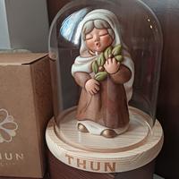 donna con ulivo con campana Thun