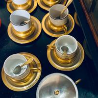 Set da Caffe’ in porcellana e ottone