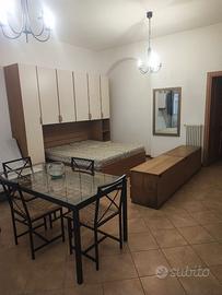 Armadio a ponte e letto